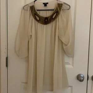 Sheer sheath dress with beaded detail